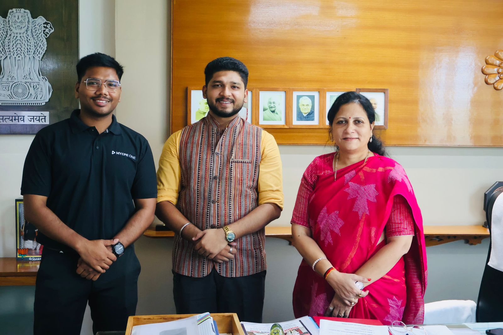 Social Eye Foundation team members meeting a government official in her office.
